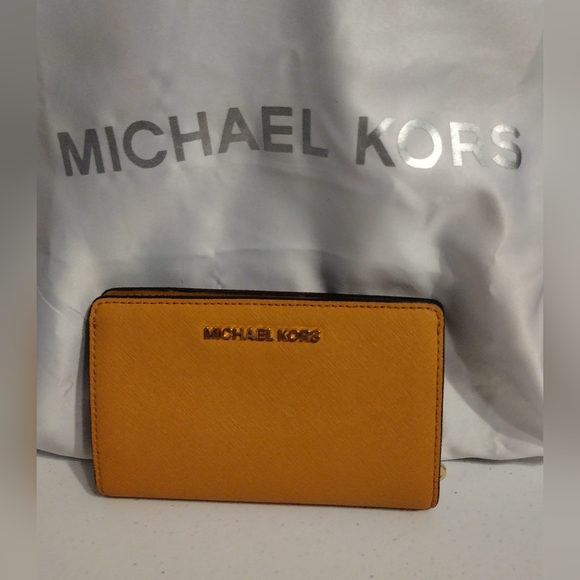 Michael Kors Handbags - Michael Kors Marigold Wallet NWOT